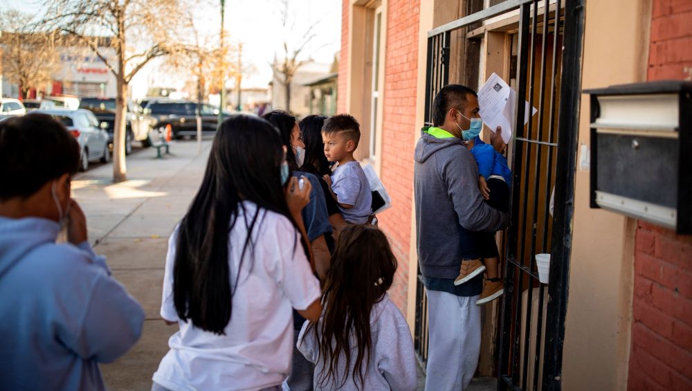A migrant family is dropped off Dec. 13, 2022, at a local migrant shelter run by the Annunciation House in downtown El Paso, Texas. A migrant family is dropped off Dec. 13, 2022, at a local migrant shelter run by the Annunciation House in downtown El Paso, Texas.
